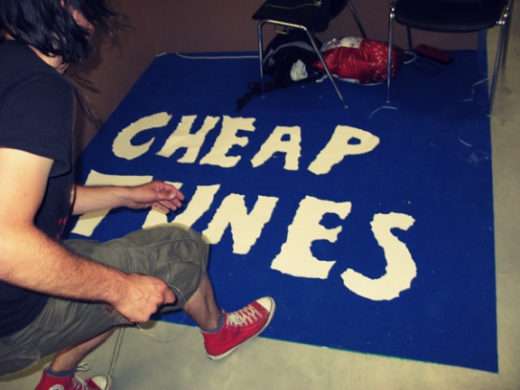 Cheap Tunes Records is run by a collective of friends who call themselves music lovers and share a common passion for creating music, sales booth in the making, 2008