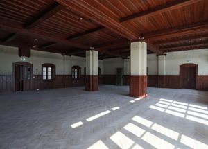 The renovated interior of the <!--LINK'" 0:181-->, a former hotel from the early 20th century, renovation led by <!--LINK'" 0:182-->, 2017.