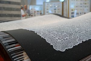 A replica of a 6 sqm large lace tablecloth, ordered and made in 1976 by 14 Idrija lacemakers from 34.560 metres of cotton tread for Tito's wife Jovanka who has never received the gift. Exhibited at <!--LINK'" 0:145-->, 2008