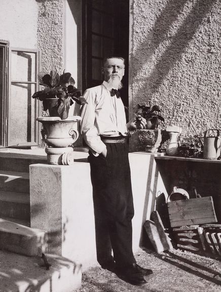 Jože Plečnik, standing in front of the cylindrical extension of his house in Trnovo, 1926. Photo by Museum and Galleries of Ljubljana documentation/Plečnik Collection.