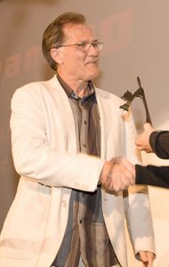 Brian Yuzna receiving the Reanima Cat award at the <!--LINK'" 0:271--> 2008