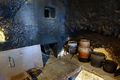Black kitchen (Črna kuhinja) with an open fireplace and bread oven, <!--LINK'" 0:1166-->, 2013