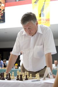 Grandmaster Anatoly Karpov as a special guest at a simultaneous chess party at the <!--LINK'" 0:92--> 2008