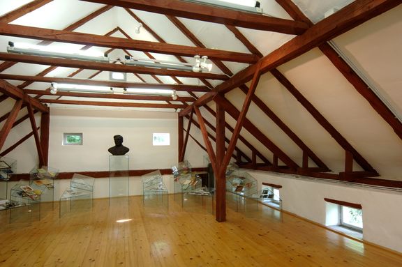 France Bevk Homestead, the attic in which Slovene writer France Bevk (1890–1970) wrote his first book as a 12-year-old boy, transformed into an exhibition room displaying documentation relating to the writer's life and work