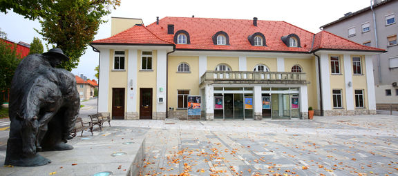 The square in front of the Cerknica Culture House, featuring a statue of a famous fictional character from Slovene literature, Martin Krpan, 2017