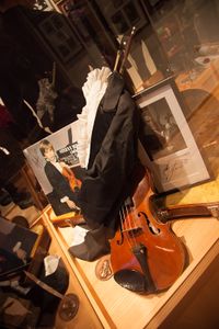 An autograph of Stefan Milenković, a Serbian child prodigy and famous concert violinist, his first violin and a frock coat. Part of the Philographic Collection of the <!--LINK'" 0:117--> at Ana's Mansion, 2012