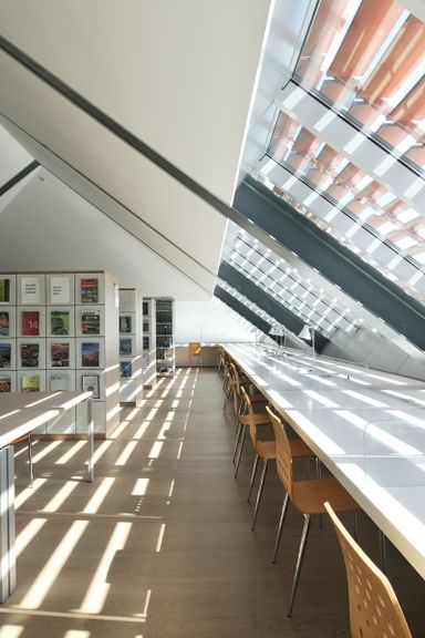 The reading room in the attics of the Celje Central Library. STVAR architects, 2011