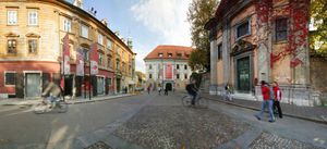 The <!--LINK'" 0:7--> facade in the background, with the <!--LINK'" 0:8--> church facade on the right, 2006