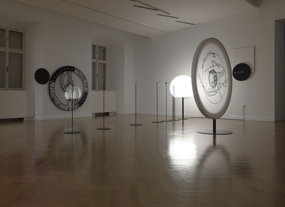 The Wheel – 5200 Years, an exhibition view with the models of Herman Potočnik's space station drawings from 1929. City Museum of Ljubljana, 2013