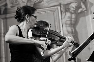 <!--LINK'" 0:81--> performing the 17th Century music at the <!--LINK'" 0:82--> 2013. The venue,  <!--LINK'" 0:83-->,  was set up by the Habsbourgs in the 14th Century, however, later on it was rebuilt and at the end of the 17th Century Franz Ignaty Flurer painted the Baroque illusionist frescoes.