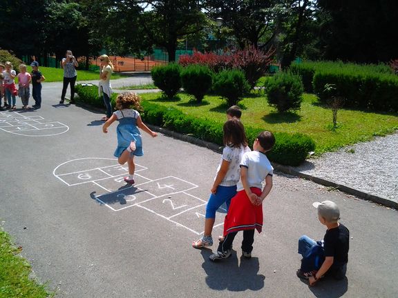 The old street game 'Ristanc' in front of the National Museum of Contemporary History, 2013.