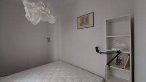 The bedroom of the Slovene Arts & Culture Residency, Berlin, 2022