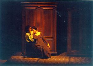 <i>Cricket in the Fist</i> by Muzeum Theatre, staged at the VIBA Studio, St. Joseph's Church, 1994. "The image simbolizes theatrical and art historical iconography as a time machine travelling back into middle age, to the gesture of the written word." Performing: <!--LINK'" 0:452--> and <!--LINK'" 0:453-->
