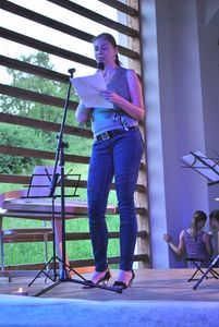 <!--LINK'" 0:302-->, a translator, reading Rivera's poems at the Museum of Baroque in Šmarje pri Jelšah, <!--LINK'" 0:303--> 2015