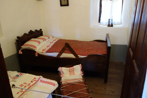 The only bedroom in the house, where France Prešeren's parents slept with the youngest child of the family, who slept in a crib, Birthplace of France Prešeren, 2013