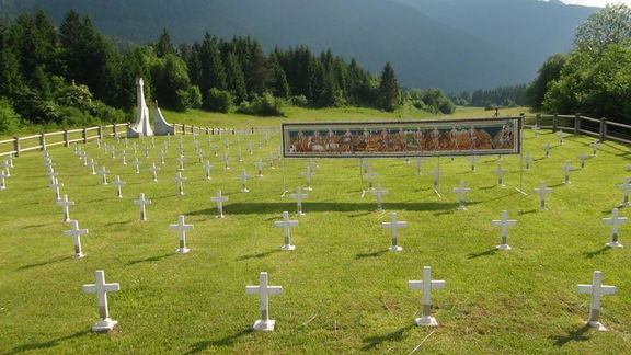 The Animal Dance Macabre painting by the Domestic Research Society at the Rebro World War I cemetery, Triglav National Park, 2015