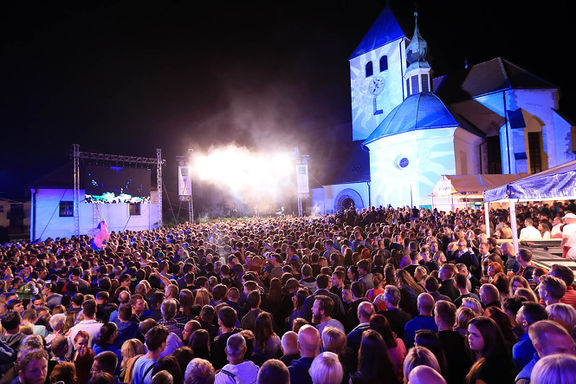 The Gibonni band performance at the Beer and Flower Festival in the old town center of Laško, 2016