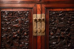 Exquisite wooden carving detail on a piece of 19th-century Chinese furniture in the Skušek Collection, <!--LINK'" 0:19-->.