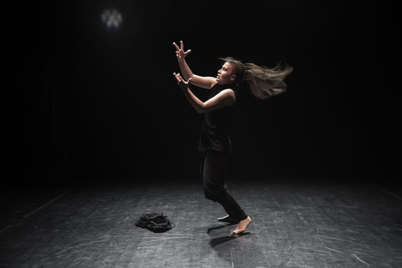 Veronika Valdés on the small stage of the Slovene National Theatre Maribor during her piece Zaklenjeno [Locked], performed at the Festival Performa & Platforma, 2017