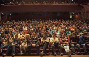 The gathered audience for a lecture by the legendary female climber Lynn Hill, taking place at <!--LINK'" 0:231-->, 2015.