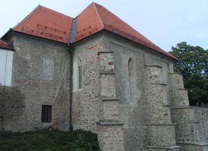 The south-east view of the synagogue after its restoration in 2001. The building forms a part of the Maribor medieval town walls above the Drava River; <!--LINK'" 0:16-->.