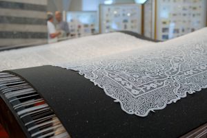 A replica of a 6 sqm large lace tablecloth, ordered and made in 1976 by 14 Idrija lacemakers from 34.560 metres of cotton tread for Tito's wife Jovanka who has never received the gift. Exhibited at <!--LINK'" 0:170-->, 2008