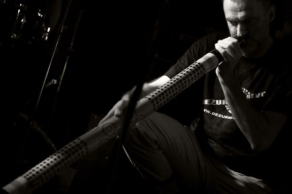 Dario Cortese, playing on didgeridoo during the Crazed Farmers performance at Klub Gromka, 2009