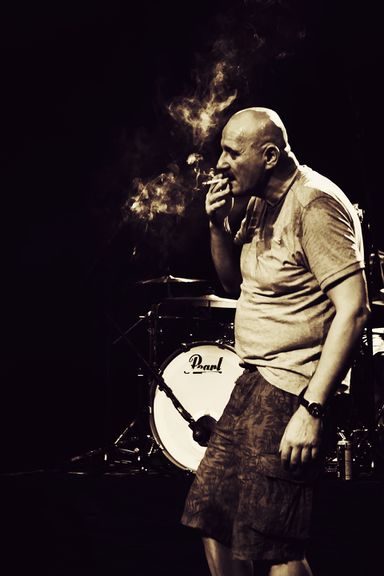 Goran Šalamon, Demolition Group, taking a cigarette break at the concert on the Trnfest Festival, organised by KUD France Prešeren Arts and Culture Association, 2013.