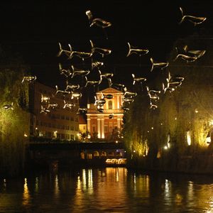 <i>Anchovies over Ljubljanica river</i> by French collective Aerosculpture, <!--LINK'" 0:621-->, 2008