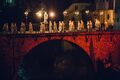 Skofja Loka Passion Play 2015 Hooded figures on a bridge Photo Tadej Pisek.jpg