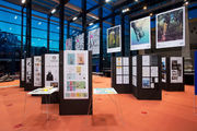 The glass entrance hall of the National Gallery of Slovenia hosting the Biennial of Slovene Visual Communications, 2015