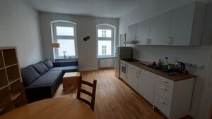 Living room and kitchen of the Slovene Arts & Culture Residency, Berlin, 2022