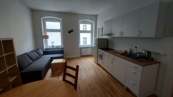 Living room and kitchen of the Slovene Arts & Culture Residency, Berlin, 2022