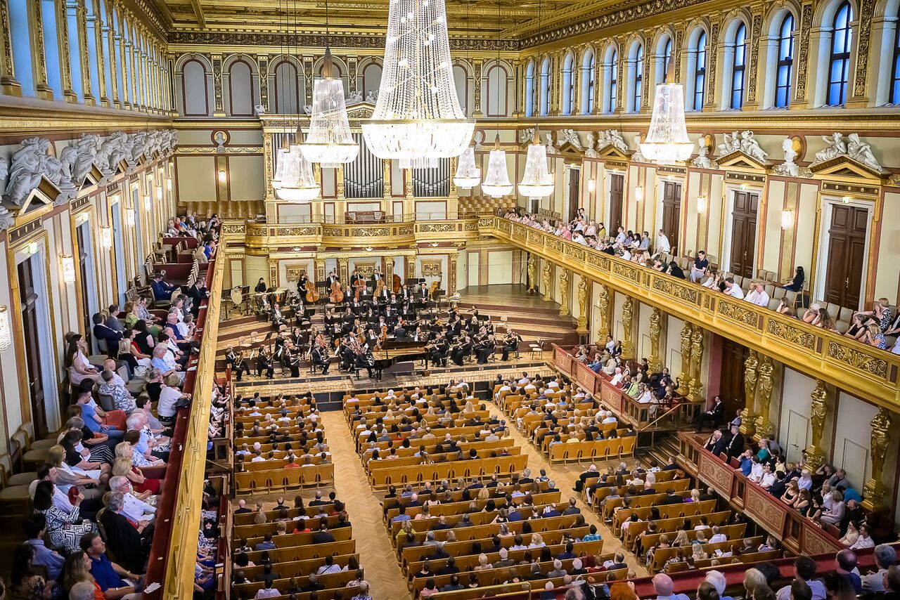 The concert by Slovene Philharmonic Orchestra conducted by Douglas Boyd, presenting Alexander Gadjiev on piano, took place at Musikverein in June 2024. The event was organised by SKICA Vienna.
