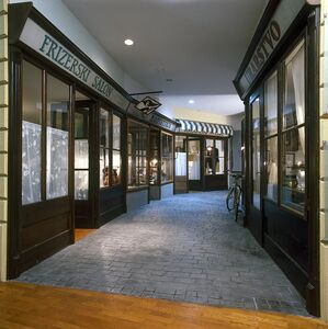 the second floor of the permanent exhibition <i>Living in Celje</i> shows historical recreations of streets artisans craft shops, market and the middle-class housing, <!--LINK'" 0:673-->
