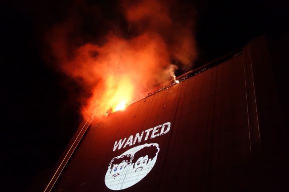 eVenti Verticali performing "Wanted" on the Cankarjev dom facade as part of Ana Desetnica International Street Theatre Festival, 2013