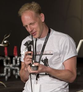 Joerg Buttgereit with Necro Cat award at the <!--LINK'" 0:287--> 2009
