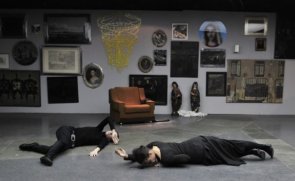 The Repository WU ST produced by Muzeum Institute, Jakopič Gallery, 2009. A dance-theatre performance with the City Museum of Ljubljana artefacts and works by contemporary authors (e.g. Polona Maher in the centre of the picture)