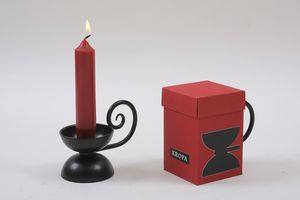The <!--LINK'" 0:45--> offers various souvenirs related to decorative metalwork. This particular candlestick is based on a design by the renowned architect [[::Category:Plečnik_heritage|Jože Plečnik]].