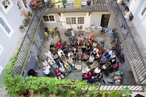 A poetry reading and painting exhibition, held in one of the courtyards in Maribor and organised by the <!--LINK'" 0:40-->, 2017
