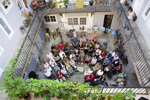 A poetry reading and painting exhibition, held in one of the courtyards in Maribor and organised by the <!--LINK'" 0:35-->, 2017
