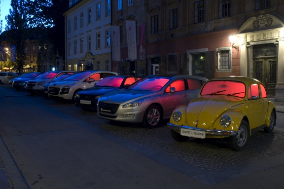 Garland of 9 cars by French space designer Benedetto Bufalino, Lighting Guerrilla Festival, 2011