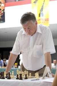 Grandmaster Anatoly Karpov as a special guest at a simultaneous chess party at the <!--LINK'" 0:249--> 2008