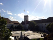 Ljubljana Castle courtyard, venue for performing arts events, exhibition projects and film screenings i.e. Kinodvor Cinema's Film under the Stars during the summertime. Viewing tower in the background, 2012