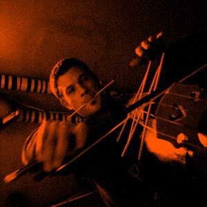 Double bass player <!--LINK'" 0:35--> of <!--LINK'" 0:36--> has contributed greatly to the improvised music scene.
