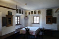 Main living area at <!--LINK'" 0:1167-->, biggest room of the house containing the tiled stove and the benches for older children to sleep on. This table was used only at special occasions, 2013