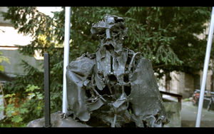 A still frame from <!--LINK'" 0:292--> promo video featuring a bust of <!--LINK'" 0:293-->, the leading Slovene Impressionist painter and patron of arts. A public sculpture created by <!--LINK'" 0:294--> in 1969 is located in front of the <!--LINK'" 0:295-->. Shot in 2013.