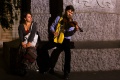 Street musicians playing under the statue of a romantic poet <!--LINK'" 0:946--> on Prešeren Square, the central square in <!--LINK'" 0:947-->, 2014