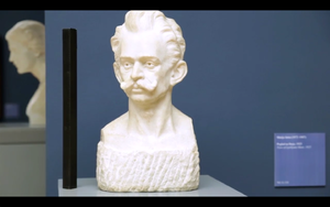 A still frame from <!--LINK'" 0:303--> promo video featuring a marble bust of <!--LINK'" 0:304--> (1876&ndash;1918), the beginner of Modernism in Slovene literature, sculpted by <!--LINK'" 0:305-->, shot in <!--LINK'" 0:306-->, 2013.