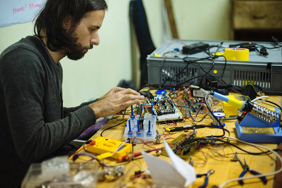 Tilen Sepič preparing a light installation at PIFcamp, 2015